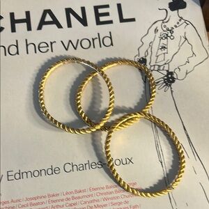 CHANEL Gold-Tone Twisted Bracelets
